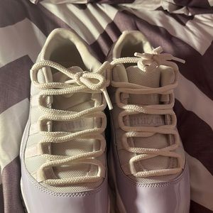 White and purple low top jordans